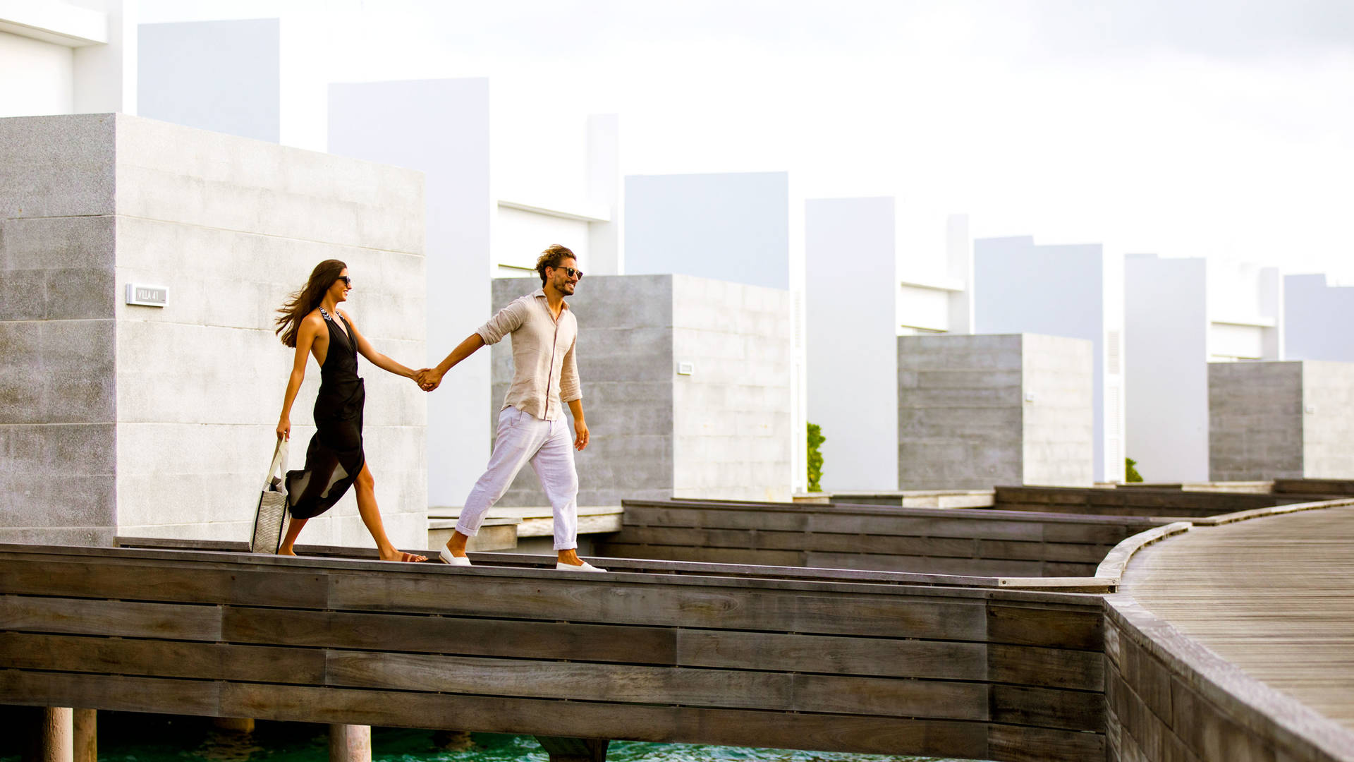 Jumeirah Maldives Ohahali Island couple near water villas